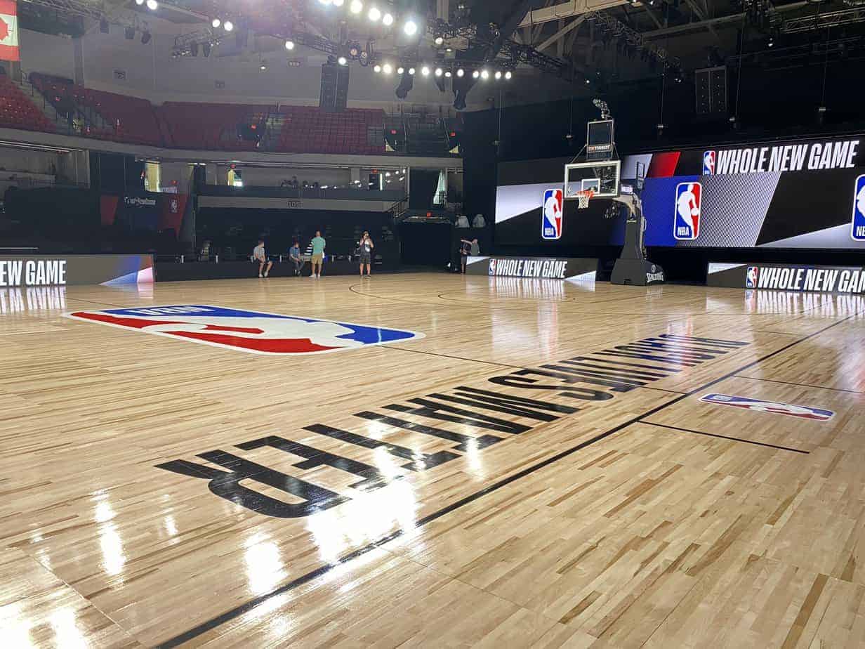 Pictures of the NBA bubble TV broadcast courts have been released and they have "Black Lives Matter" on them and socially distanced benches.
