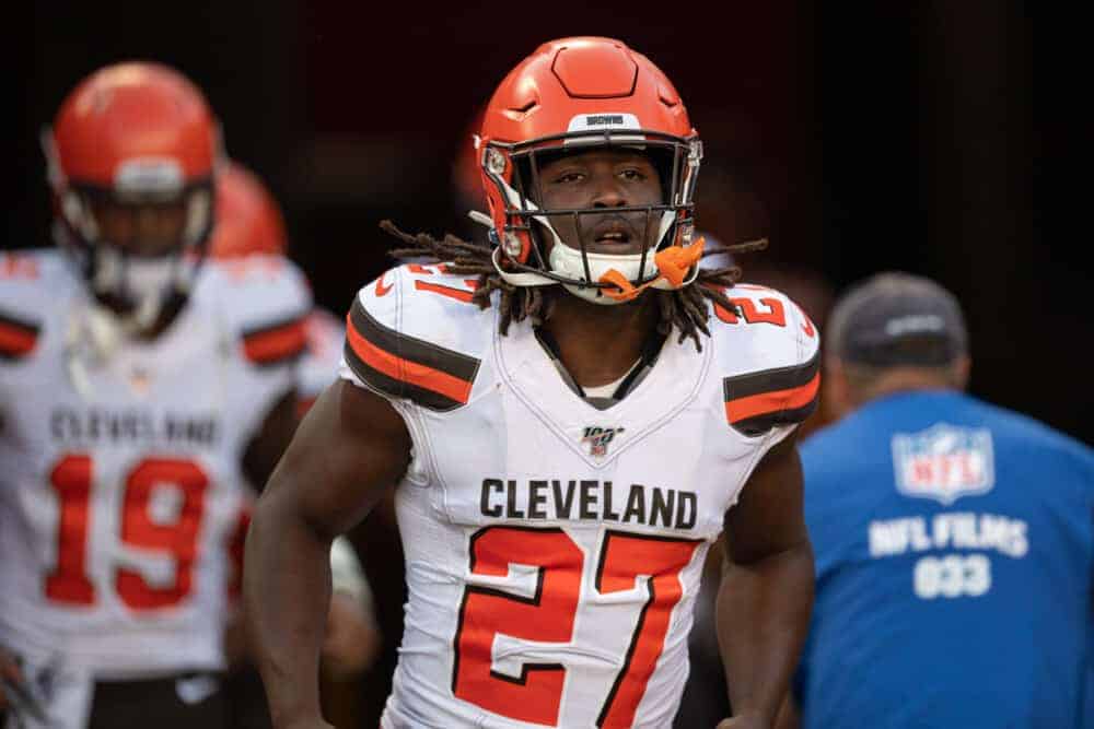 NFL DFS DraftKings FanDUel picks lineup optimizer today tonight Week 14 daily fantasy NFL player props picks best bets betting odds lines predictions parlays free expert advice tips strategy Kareem Hunt