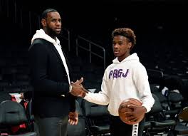 LeBron James took to social media to share his excitement with his son, Bronny James, being feature on the Sports Illustrated cover