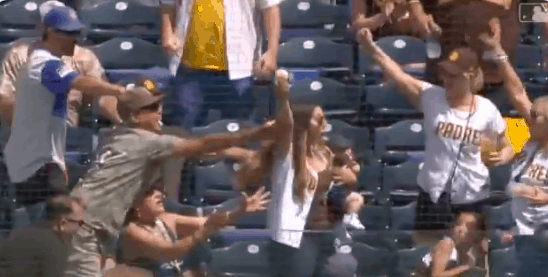 A San Diego Padres fan created all the buzz on Wednesday night when she made a great catch while carrying a baby in her other arm