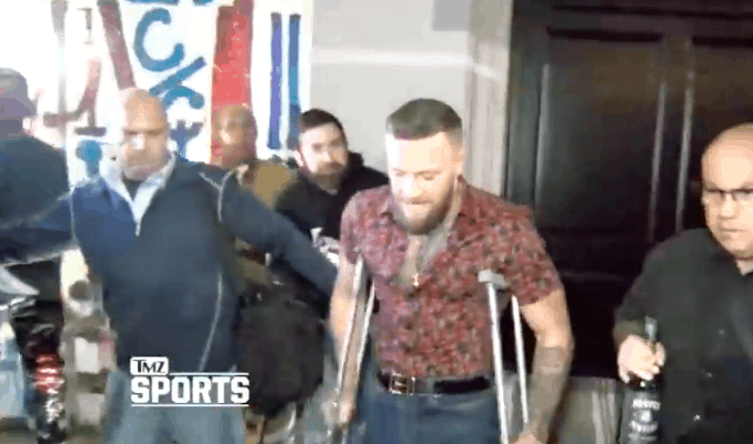 UFC star Conor McGregor was spotted out at the LA clubs using crutches early Friday morning after his nasty ankle injury during Dustin Poirier fight