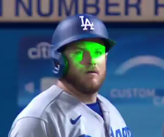 Max Muncy flashed with laser pointer