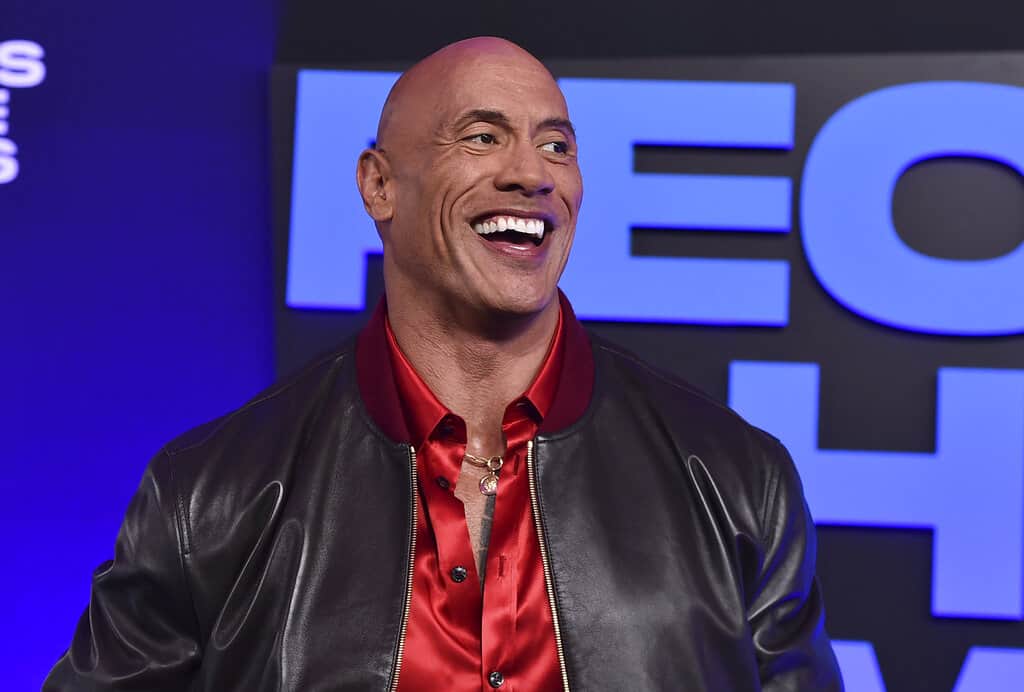 During a mic'd up moment, Joe Burrow and other players hilariously reacted to Dwayne "The Rock" Johnson's Super Bowl introduction speech